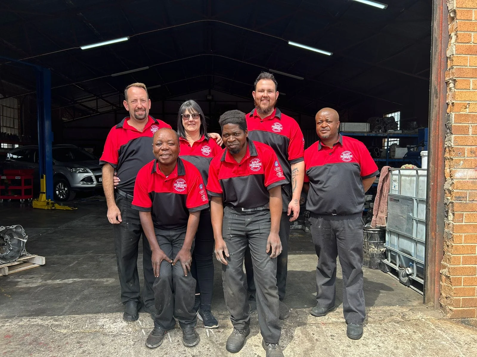 Supplied photograph of the Alfie's team outside the workshop
